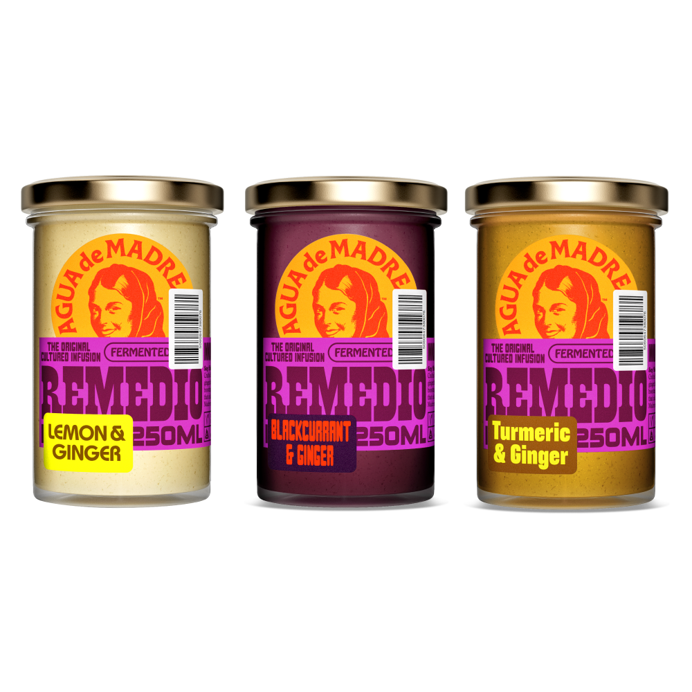 Three jars of Aguá de Madre Remedio with colorful labels on a white background